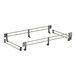 A metal frame with a pair of metal bars.