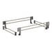 A white metal shelf rail kit with metal rods and bars.
