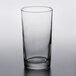An Anchor Hocking Regency highball glass on a table.