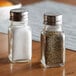 salt and pepper shakers on a table