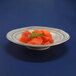 A bowl of watermelon slices in a Beach Design melamine bowl.