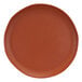 A close-up of an Elite Global Solutions round matte sunburn terra cotta speckled melamine plate.