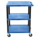 A blue Luxor utility cart with three shelves and black legs.