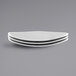 A stack of three gray speckled triangle melamine plates.