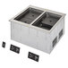 A Vollrath drop-in hot food well with two compartments on a counter.