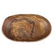 A wood grain patterned melamine oval serving bowl.