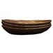 A stack of wood grain melamine oval bowls.