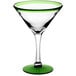 An Acopa martini glass with a clear bowl and green rim and base.