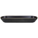 An oval black melamine bowl with a gold border.