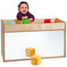 A child playing with toys in a Whitney Brothers mirrored wood storage cabinet.