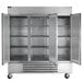 A Beverage-Air stainless steel reach-in refrigerator with three open doors.