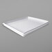 A white Elite Global Solutions food pan lid on a white tray.