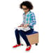 A girl sitting on a Whitney Brothers mobile STEM activity storage bin reading a book.