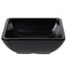 A black square Carlisle ramekin on a white surface.