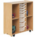 A Whitney Brothers mobile backpack storage cabinet with white bins on wheels.