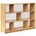 A Whitney Brothers wooden storage cabinet with white acrylic-backed shelves.