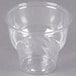 A Fabri-Kal clear plastic sundae cup on a gray background.