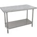 An Advance Tabco stainless steel work table with a shelf.