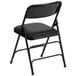 a black folding chair with a black back