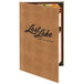 A brown leather Menu Solutions menu cover with the words "Lost Lake Restaurant" on the cover on a table.