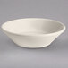 A Homer Laughlin ivory china monkey dish with a rolled edge.