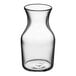 A Libbey clear glass cocktail decanter filled with a small amount of liquid.