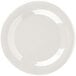 A white Carlisle melamine plate with a round rim.