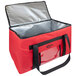 A red and black Sterno SpeedHeat insulated food pan carrier bag with a black handle.