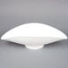 An Edlund white plastic oval shaped scale scoop.