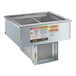 A Delfield drop-in refrigerated cold food well with two rectangular metal sections in a stainless steel cabinet.