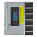A black digital display on a metal surface with a temperature in Fahrenheit.
