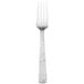 A Walco Vestige stainless steel table fork with a silver handle and silver metal.