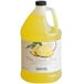 A jug of yellow Narvon Pina Colada slushy syrup with pineapple and coconut.