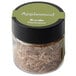 A jar of brown applewood wood chips.