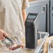 A Breville Commercial CRC-5AC1B Sous Vide Creative Series immersion circulator head being used in a water bath for sous vide cooking.