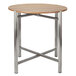 A Bon Chef oak round table top with metal legs.