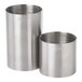 A pair of stainless steel Barfly thimble measuring cups on a counter.