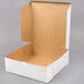 A white box with a lid open.
