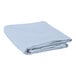A folded light blue hemmed cloth table cover.
