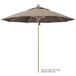 A close-up of a California Umbrella with a beige Sunbrella canopy and a wooden pole.
