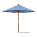 A blue California Umbrella with a brown wooden pole.