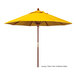 A close-up of a California Umbrella with a yellow Sunbrella canopy and wooden pole.