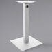 A white square table base with a metal post.