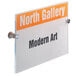 A Durable transparent acrylic sign with the words "North Gallery" on it.