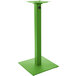 A lime green metal square table base for an outdoor umbrella.