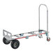 A silver metal Magliner hand truck with black wheels and a U-Loop handle.