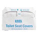 A white package with blue text containing Lavex toilet seat covers.