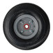 A close-up of a black wheel with a red rim.