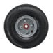 A Magliner hand truck pneumatic wheel with a silver rim.