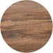 A BFM Seating Knotty Pine round table top with a brown finish and cracks.